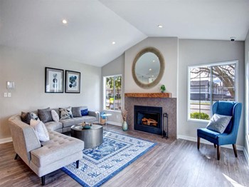Orchard Ridge Clubhouse Living Room with Fireplace Property Image