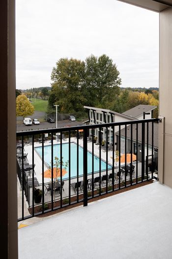 a view of the pool from the balcony