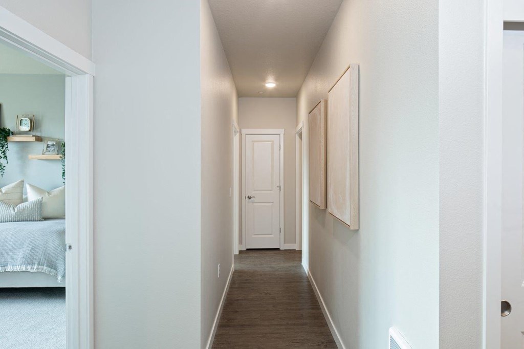 West End District Apartments in Beaverton, Oregon Hallway and View into Bedroom