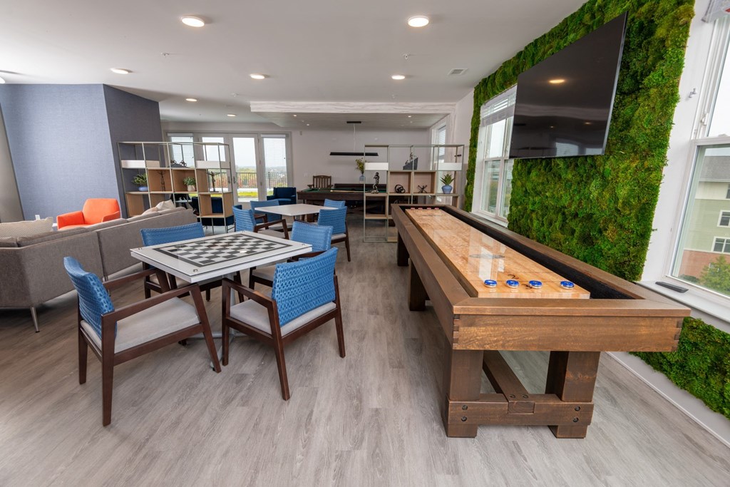 Zen Apartments Clubhouse with Shuffleboard