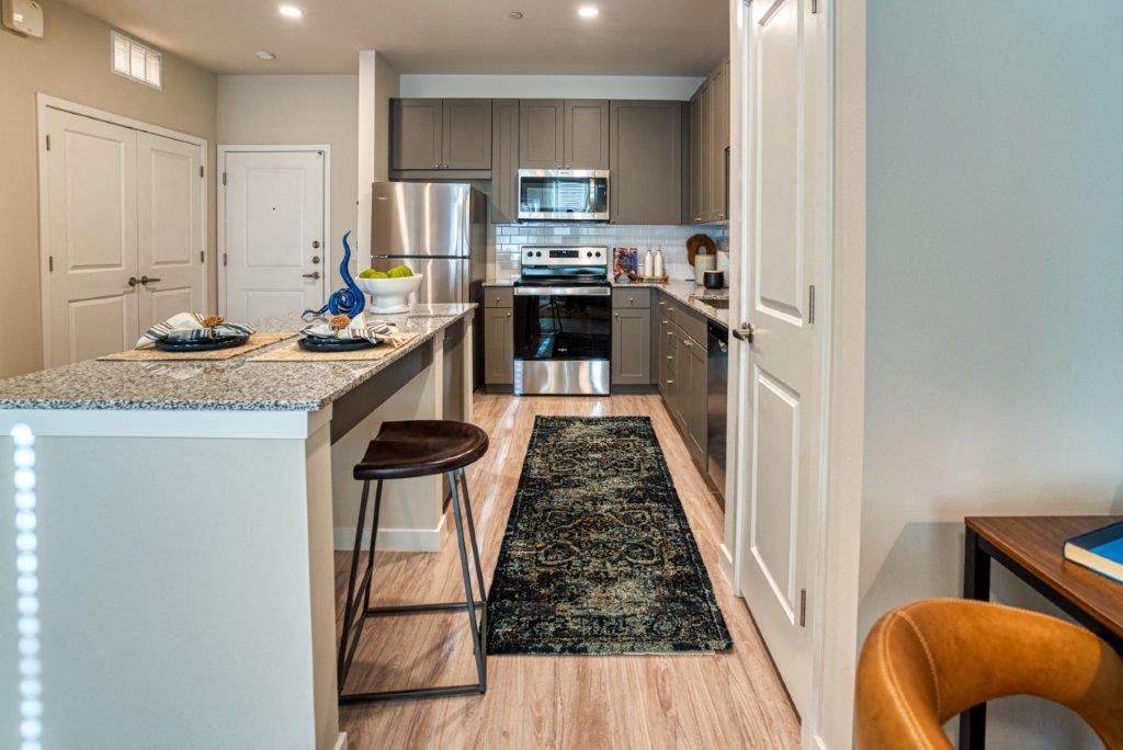 a kitchen with a counter top and a