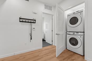 A laundry room with a washer and dryer.