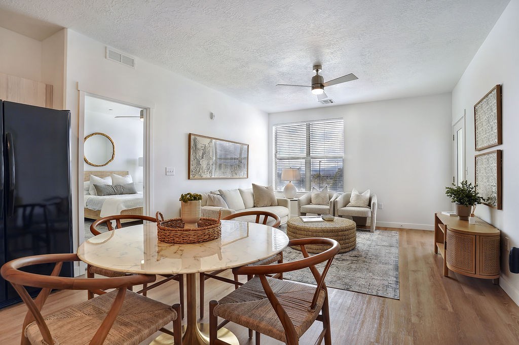 Alvera at the Meadows dining room with a round table and chairs.