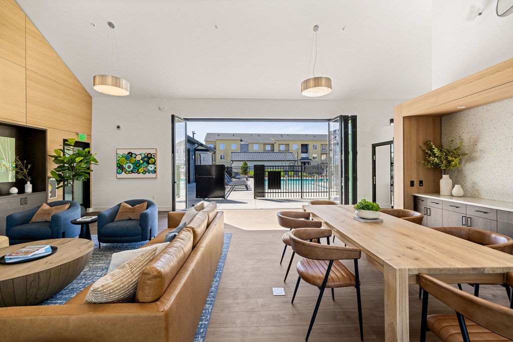 A modern living room with a view of the city.