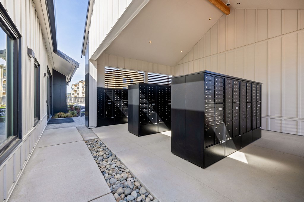 A modern building with black server racks.