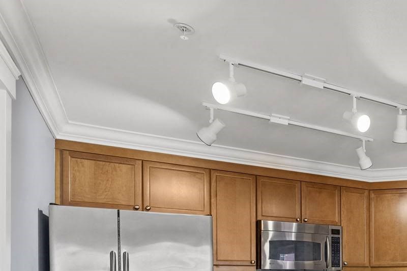 Villaggio on Yarrow Bay kitchen Villaggio on Yarrow Bay kitchen with stainless steel appliances - Photo Gallery 3