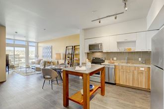 Sparc Apartments Model Kitchen and Dining Area Sparc Apartments Model Kitchen and Dining Area