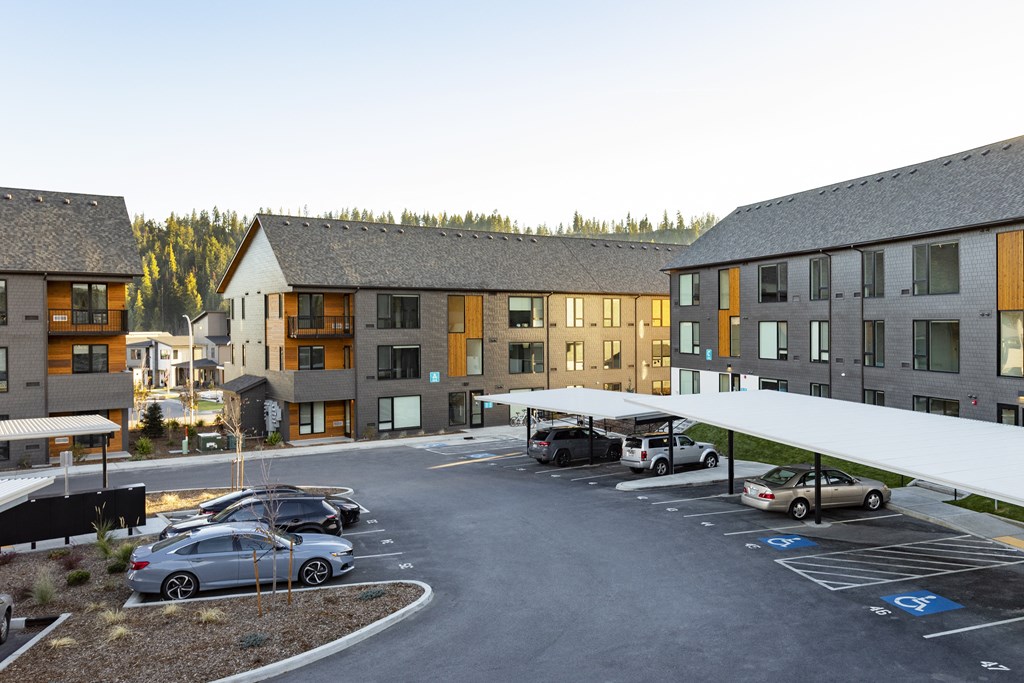 Bo Apartments parking lot with covered area