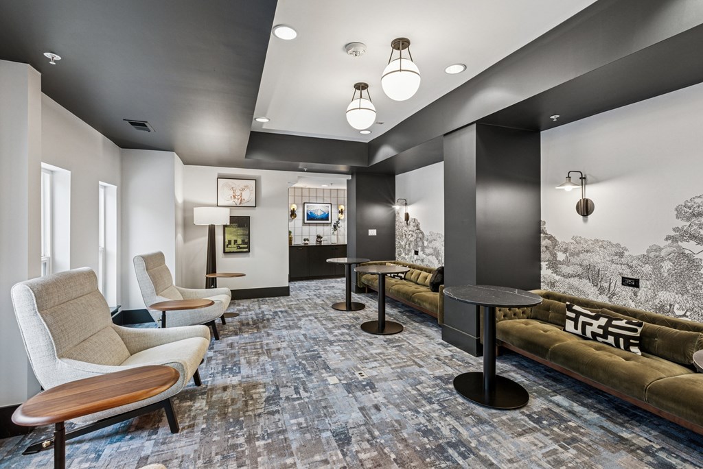 A waiting area with chairs and a bench.