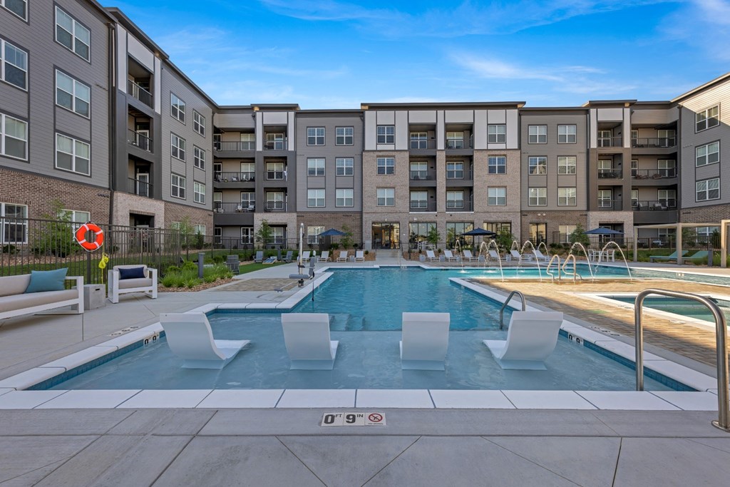 Avenue64 Luxury Apartments in O'Fallon, Missouri Pool with Lounge Chairs