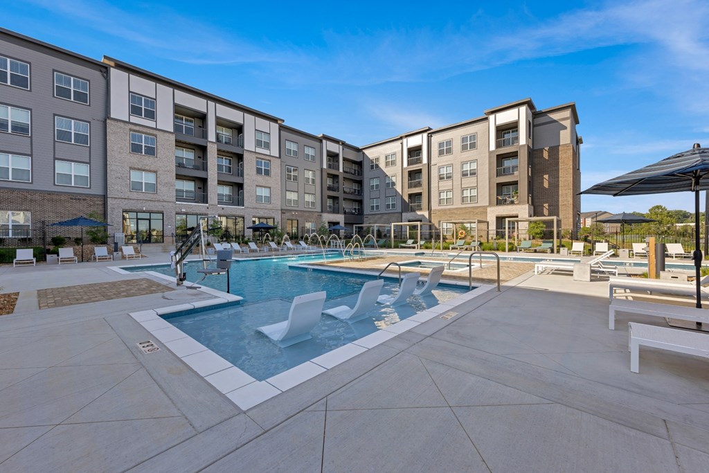 Avenue64 Luxury Apartments in O'Fallon, Missouri Pool with Lounge Chairs