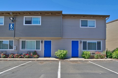 Exterior shot of blue front doors at at Block 88 Townhomes in the Hazel Dell neighborhood in Vancouver, Washington.
