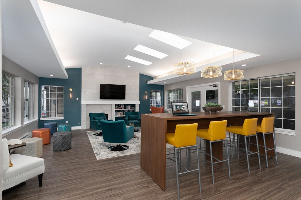 Novela Apartments Clubroom Counter and Seating with Television