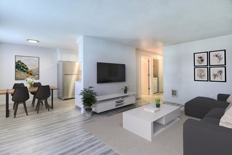 a living room with a couch and a table and a television