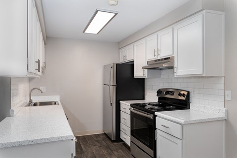 Novela Apartments Kitchen Counters and Appliances