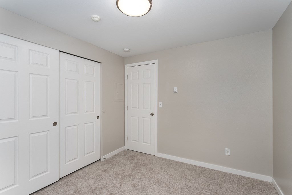 Novela Apartments Bedroom and Closet Door