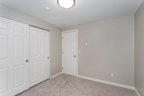 Novela Apartments Bedroom and Closet Door