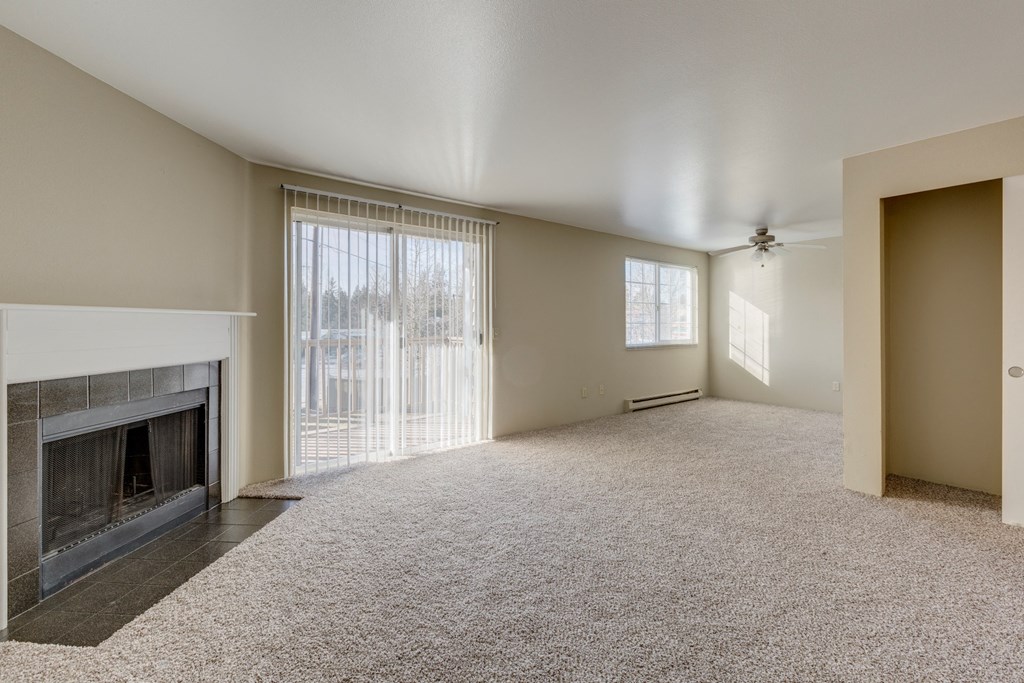 Mirabella Apartments in Everett, Washington Living Room with Fireplace and Private Patio Mirabella Apartments in Everett, Washington Living Room with Fireplace and Private Patio