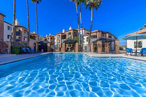 Mission Antigua Apartments in Tucson, Arizona Exterior and Pool with Lounge Chairs
