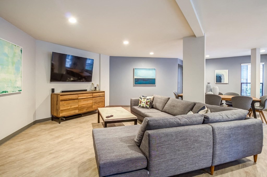 Brackett lounge area with couches and TVs