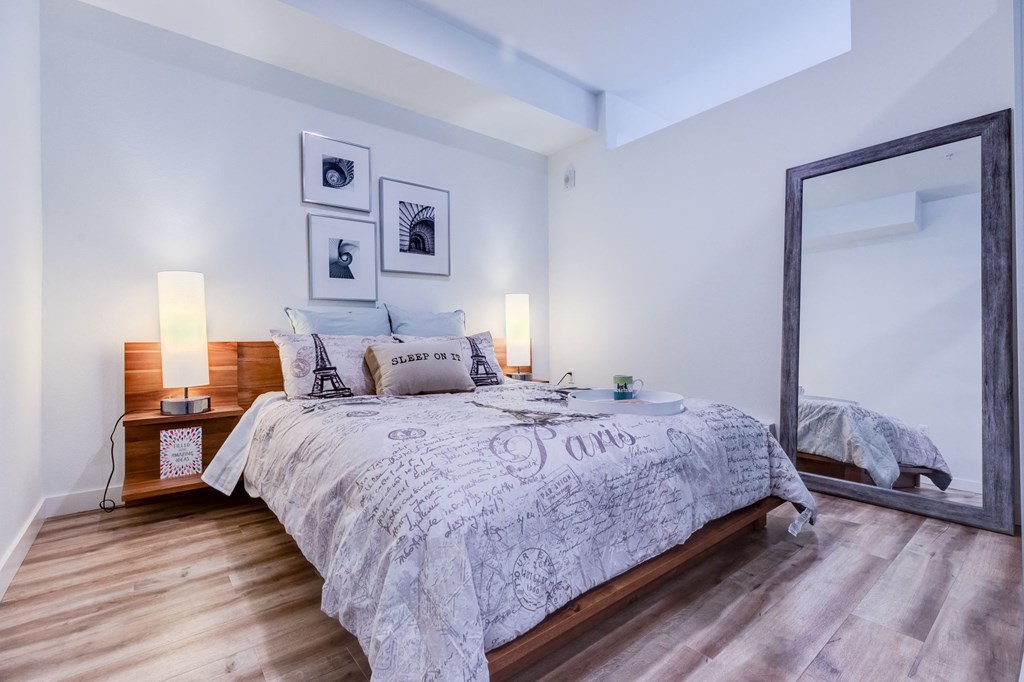 a bedroom with a large mirror and a bed a bedroom with a large mirror and a bed at Wilcox, Seattle, Washington