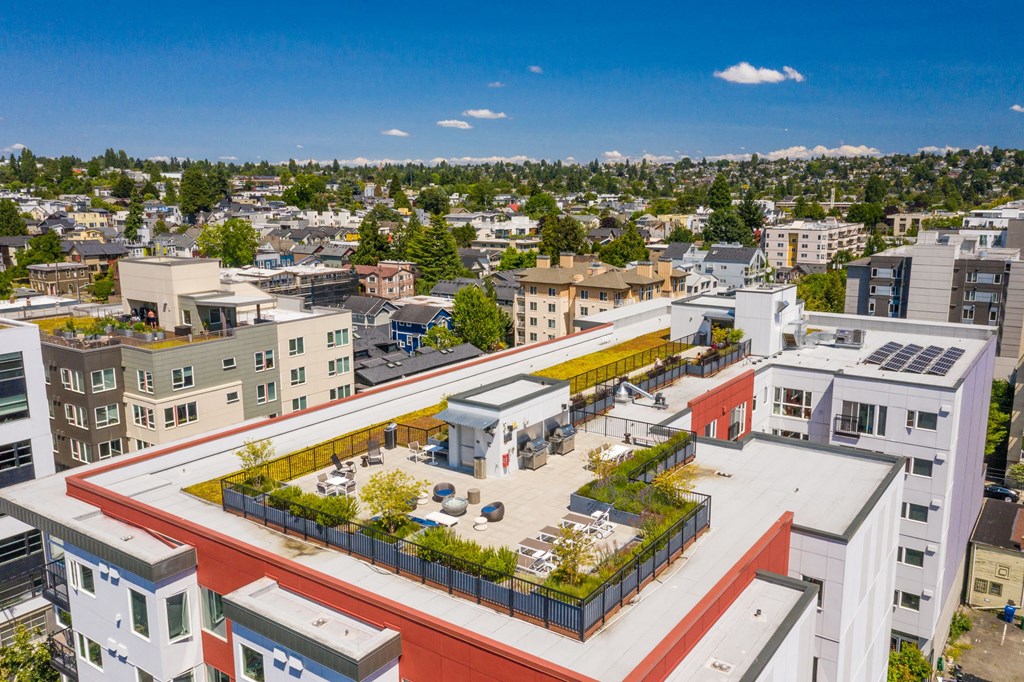 a rendering of an aerial view of a city with buildings and a courtyard at Wilcox, Washington
