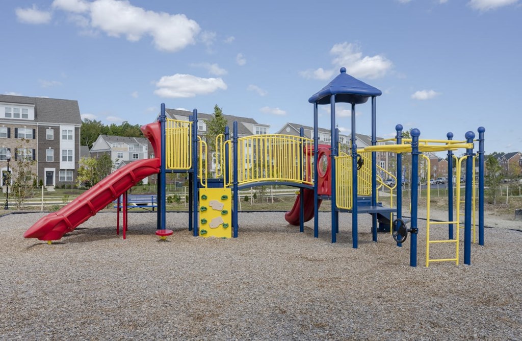 a playground at a park with slides and other playground equipment