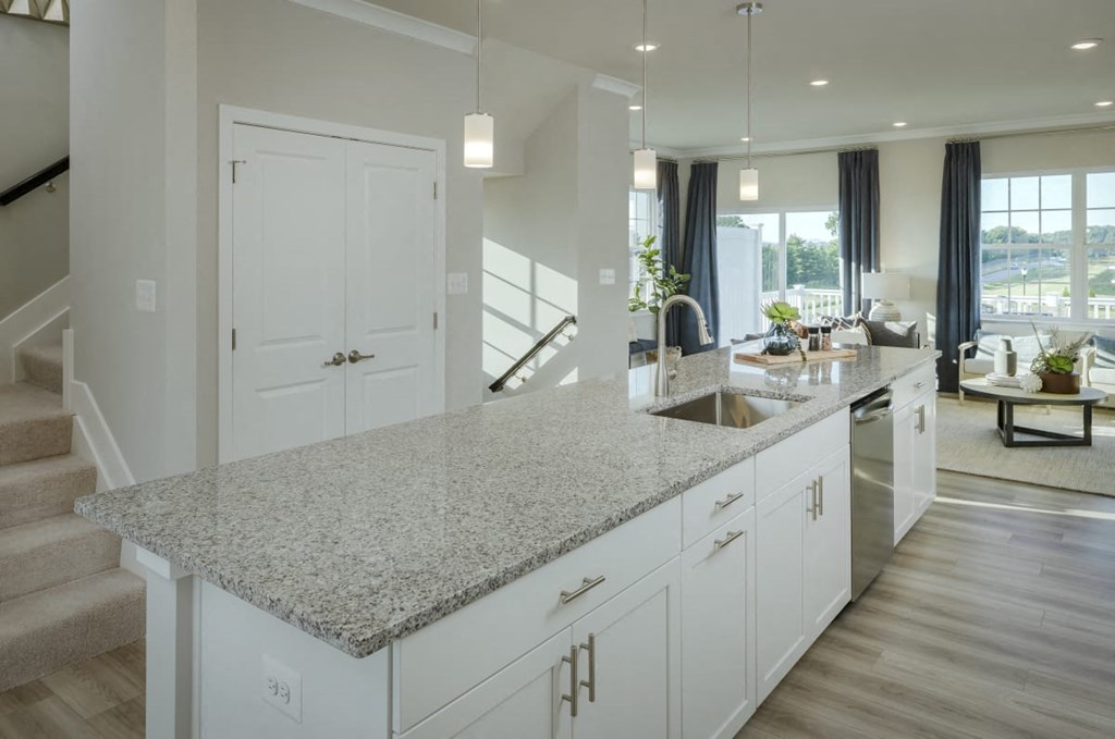 a reflection of a dining room table in a mirrored wall