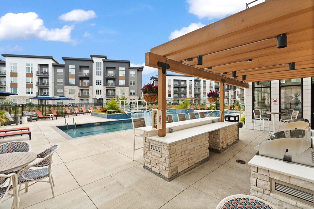 the reserve at city center apartments patio and pool area