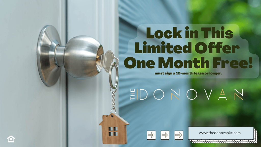 A door handle with a keychain that has a house-shaped pendant.