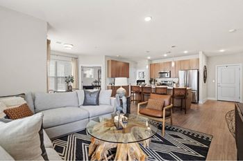 a living room with a couch and a table