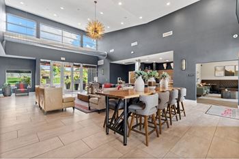 the dining room is open to the living room and kitchen