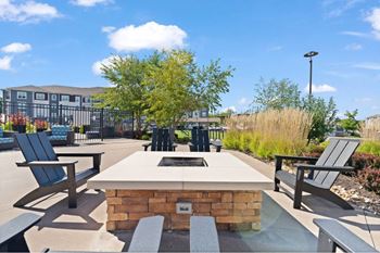 the preserve at ballantyne commons community patio with firepit and chairs
