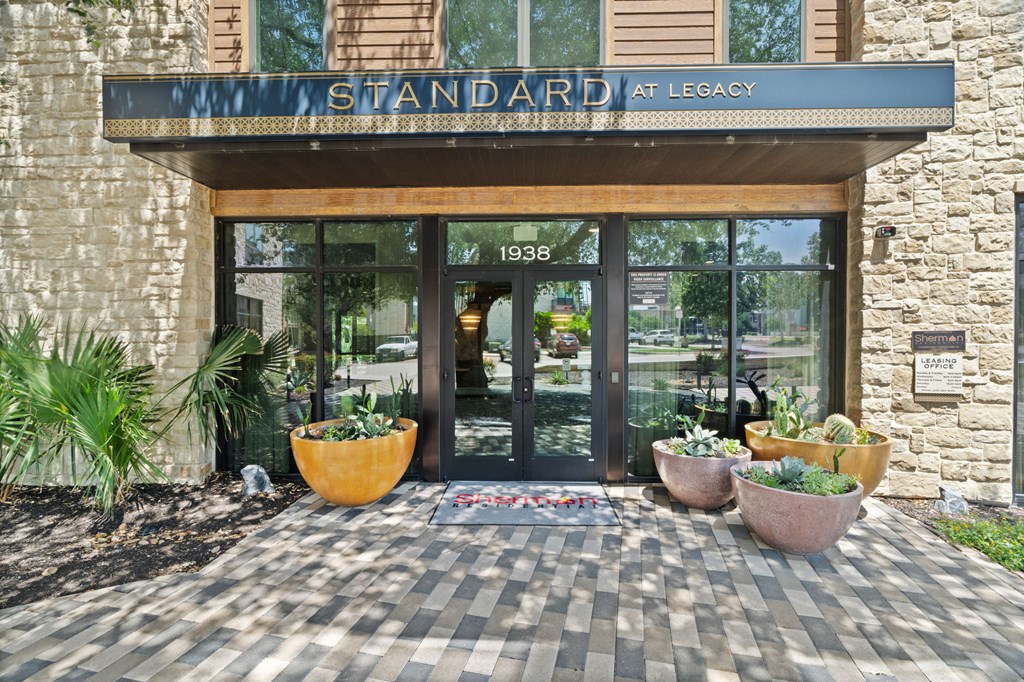 The front of a building with a sign that says