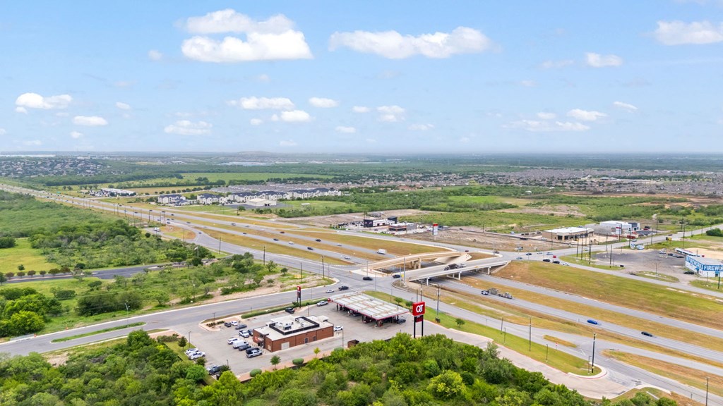 A view of a highway with a red stop sign.