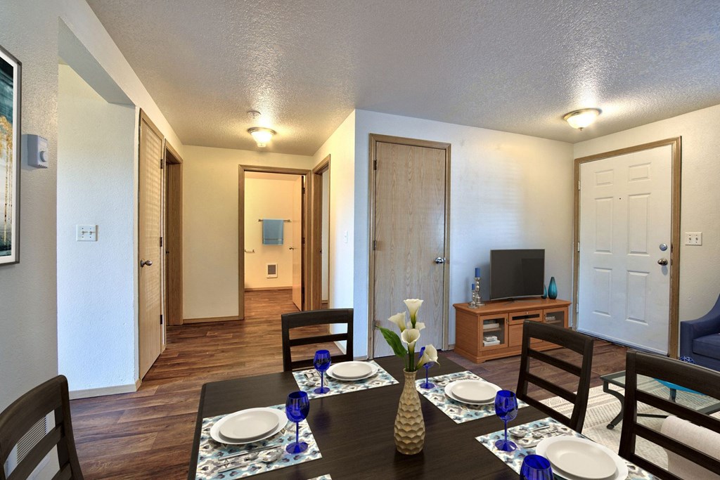 Parc East Apartments Staged dining room looking into hallway