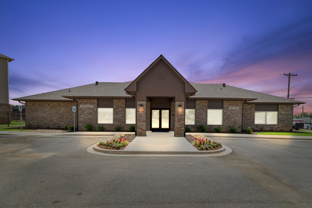 A building with a front entrance and a sign that says "Grace" on it.