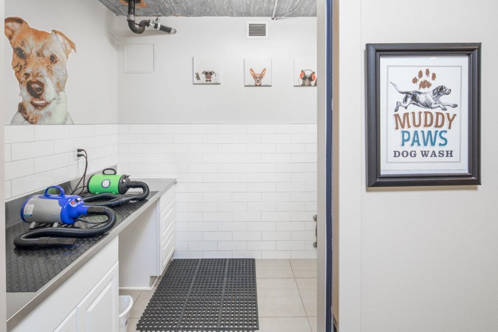 A dog wash station with a picture of a dog and the words