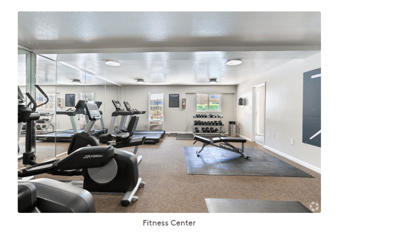 a gym with exercise equipment and a fitness center