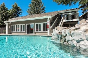 Fox Pointe Apartments Pool Area with Rock Waterfall in Pool - Photo Gallery 30