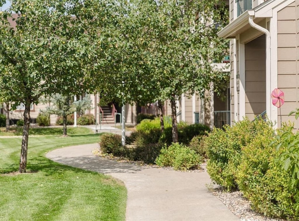 Reflections Apartments Exterior and Sidewalk