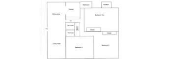 A floor plan of a house with a dining area, kitchen, living room, and three bedrooms.