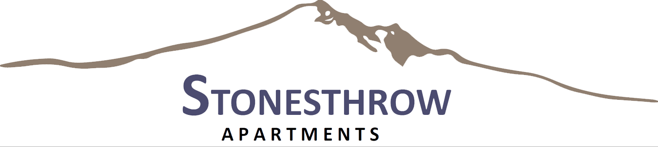 a logo with a mountain in the background
