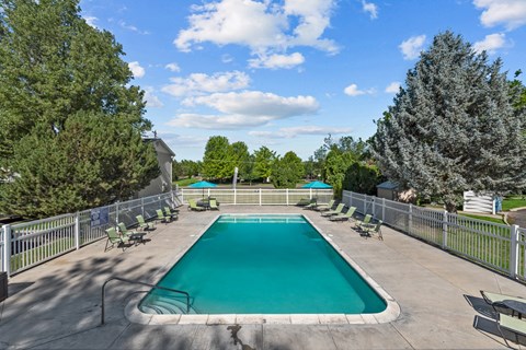 the swimming pool at woodland park apartments
