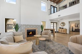 A living room with a fireplace and a couch.