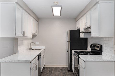 Novela Apartments Kitchen Counters and Appliances