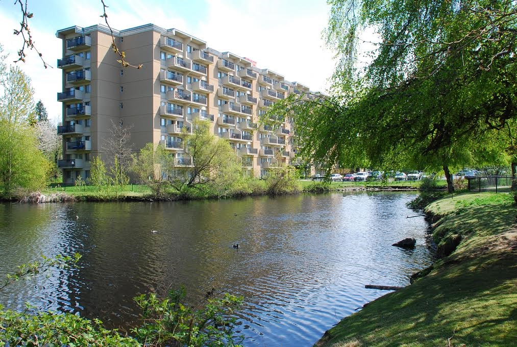 a building on the side of a river