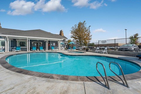 Regency Park Pool with Lounge Chairs