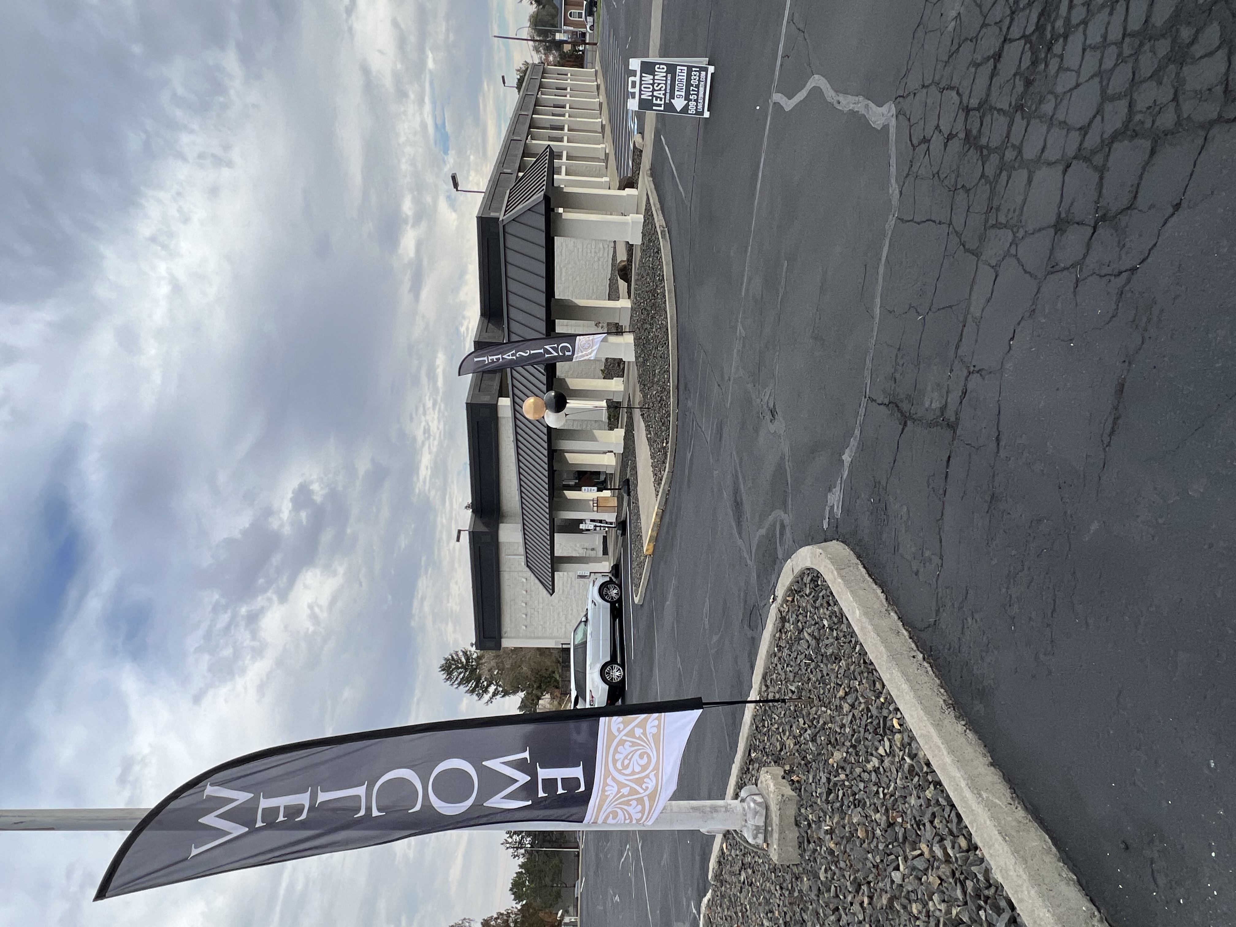 a view from above of a street with a street sign