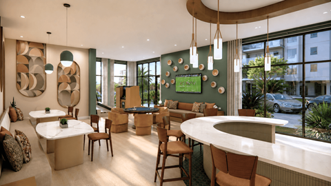 A modern dining area with a curved table and chairs.